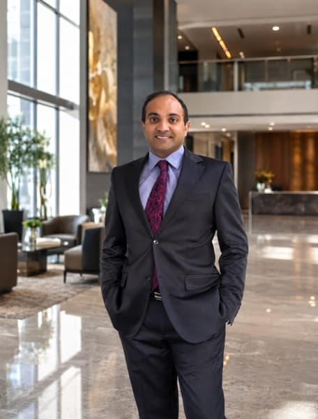 Ritesh Mani, entrepreneur and business strategist, in a hotel lobby in New Zealand